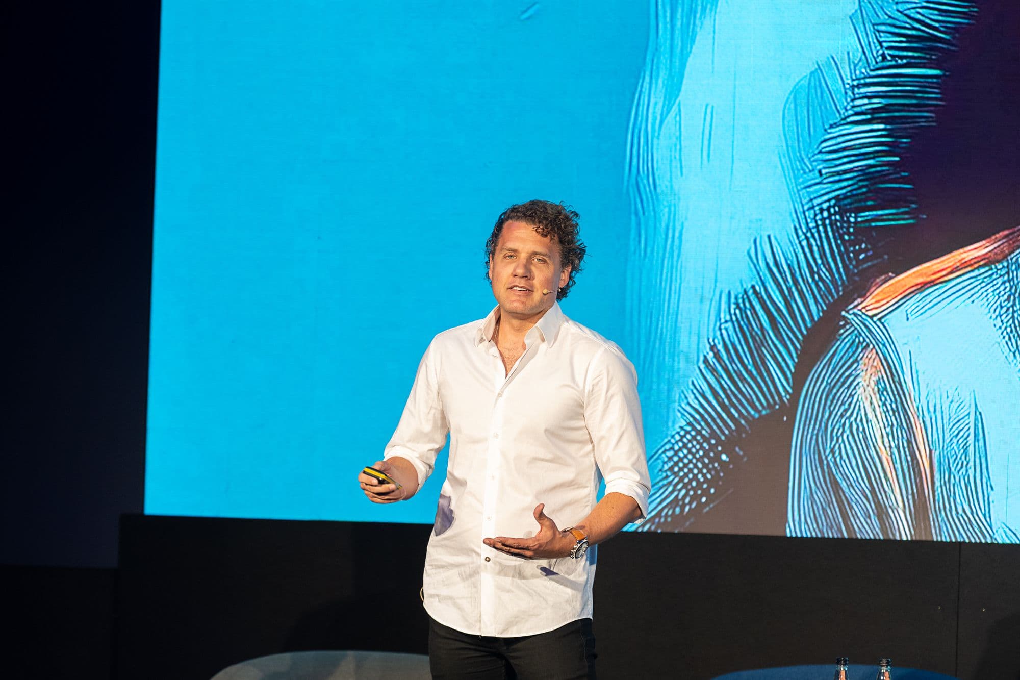 Mark Manson on stage at eXp UK Conference 2025